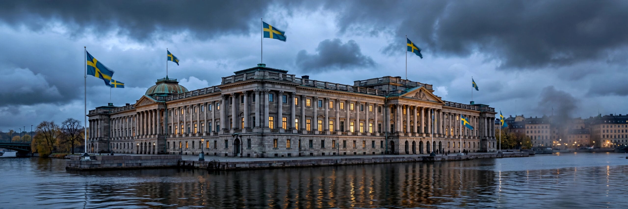 A government building in Stockholm at dusk with Swedish flags, illustrating Sweden's block on ChatGPT and Claude in government offices